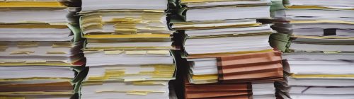 Documentos fiscais sobre a mesa, representando as mudancas fiscais de julho de 2026